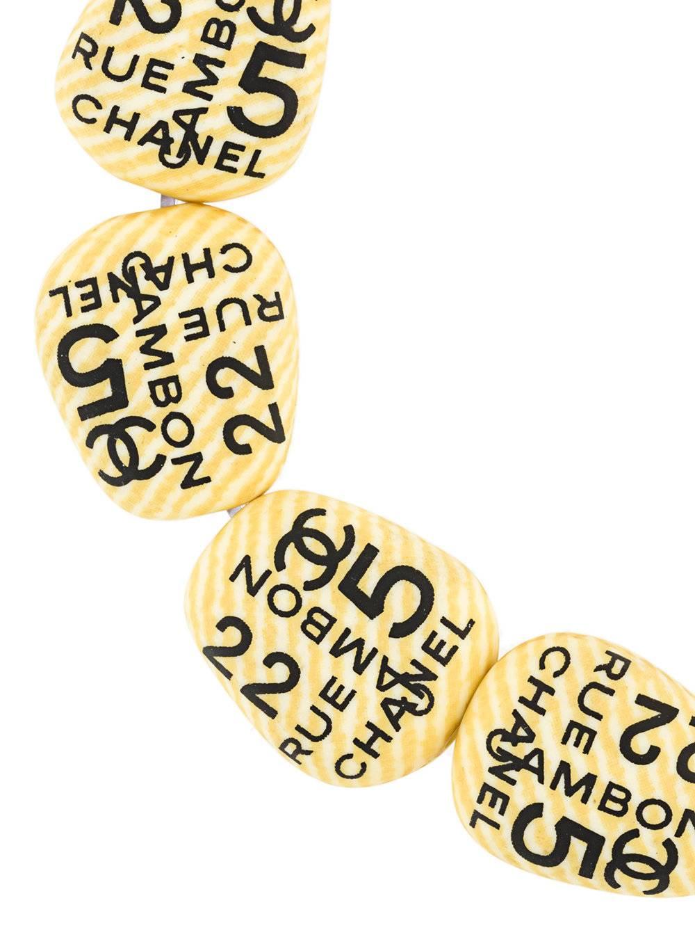 Rare Chanel set of Luck Clover n°5, Rue Cambon of 2002. Made of resin. 
Marked: Chanel 02 Made in France. 
Size of earrings: 1.2 cm, bracelet adjustable size. 
Excellent condition.  