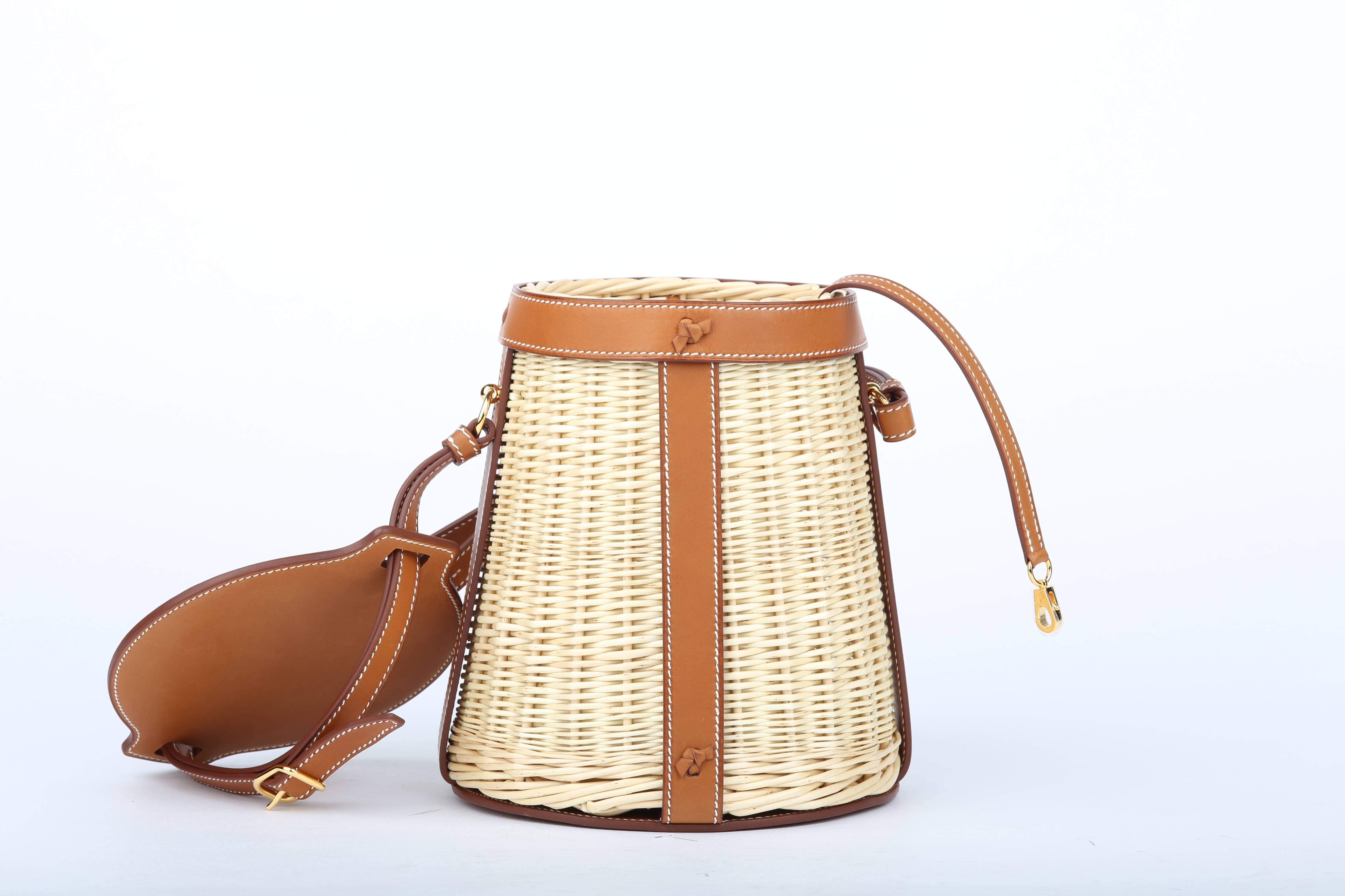 “Adding a wicker bag tops off the look and has that perfect summery, feminine feel.”
 This bag has a country feel with the elegance of Hermès’s signature tan stitched leather. Basically, it’s the holy grail of summer day bags.

This bag comes