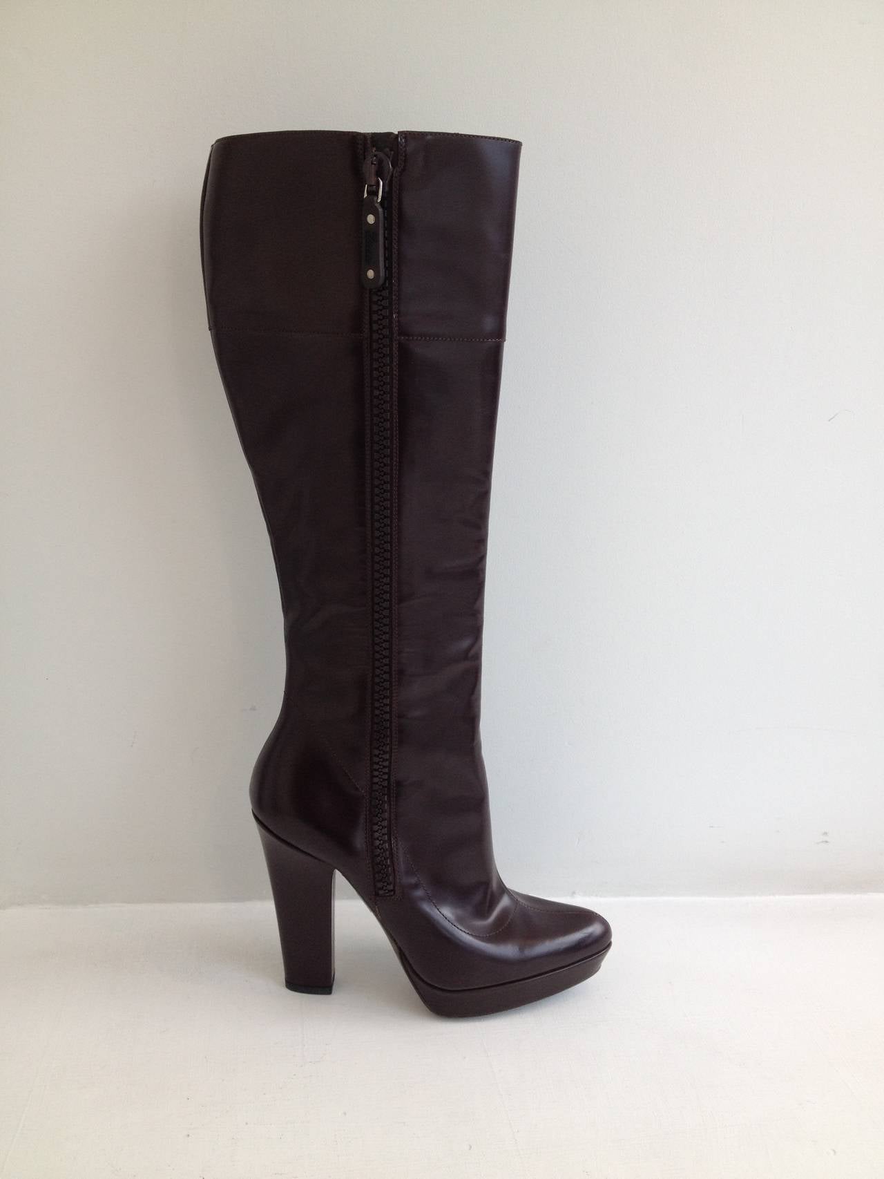 Who doesn't need a pair of flawlessly cut, expertly crafted Italian leather boots? Every fall and winter - whenever it's a little bit cold - you'll be thrilled to zip these boots up. They are a dark brown leather, warmer and softer than black, and