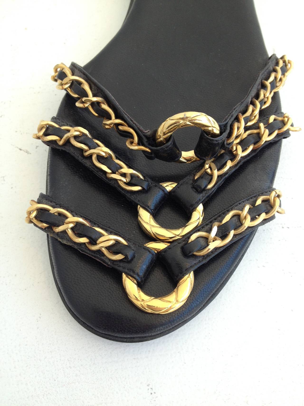 chanel black quilted slides