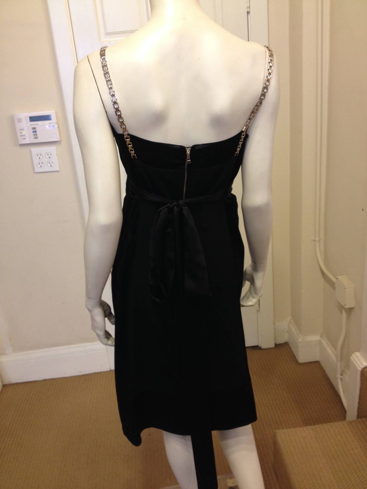 black dress with chain straps