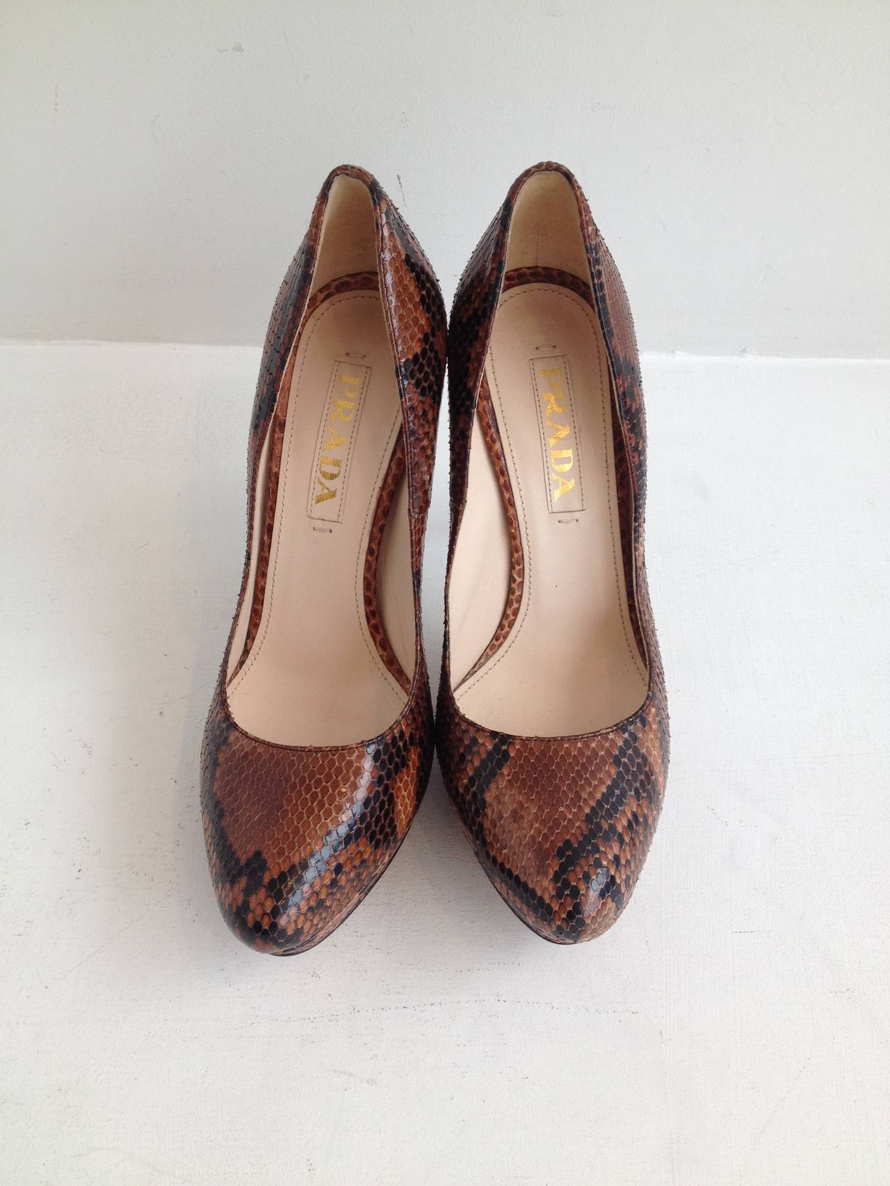 Fabulous! These Prada faux python heels are incredible. The subtle warm brown tone means that they can function as a neutral, while the glossy scales and the variation in tone between black and tan dresses them up and adds a polished and interesting