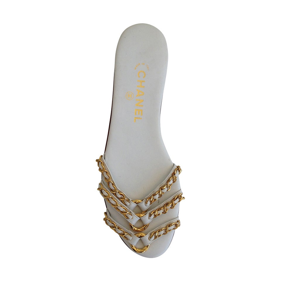 Chanel White Slides with Gold Chain at 1stDibs