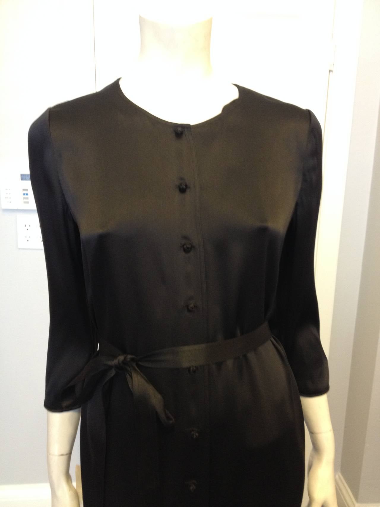 Ralph Rucci draws much inspiration from Japan - the line is named Chado after the tea ceremony, and his designs are austere and spare in line with Japanese traditional aesthetics. This piece is stunning in its simplicity - in deep black satin with