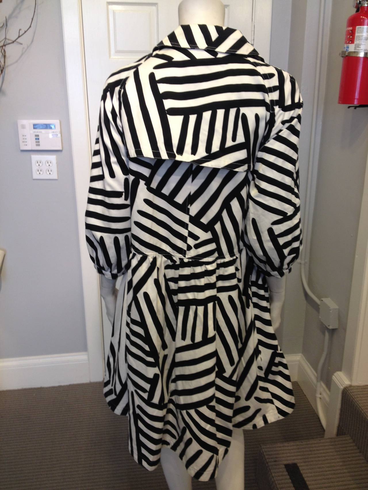 black and white striped trench coat