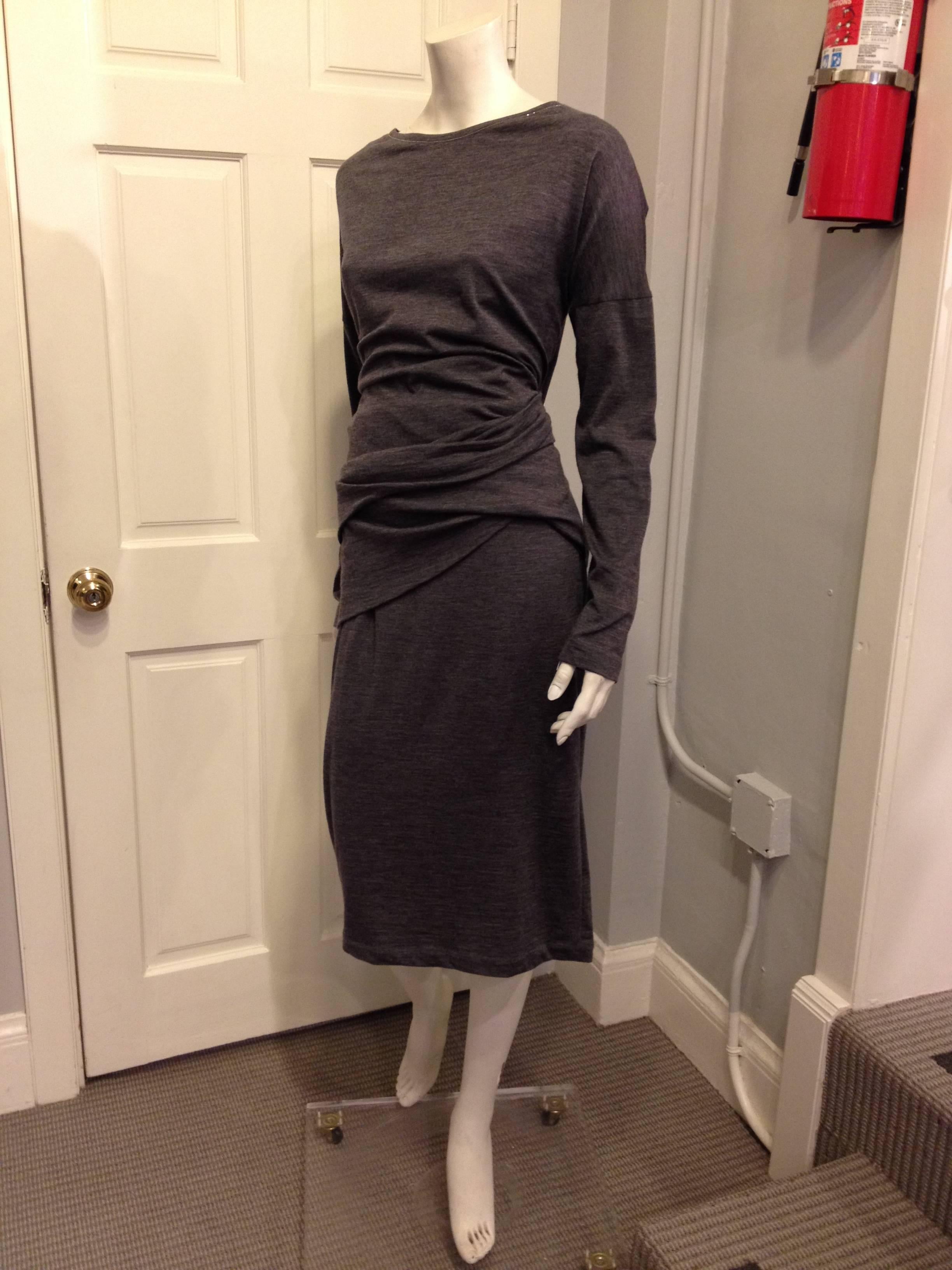 Impeccable craftsmanship and gorgeous materials set Brunello Cucinelli pieces apart. In a soft, luxurious, superfine jersey knit, this piece is perfect for lounging on the weekend to going out to dinner - it's one of those flattering dresses that