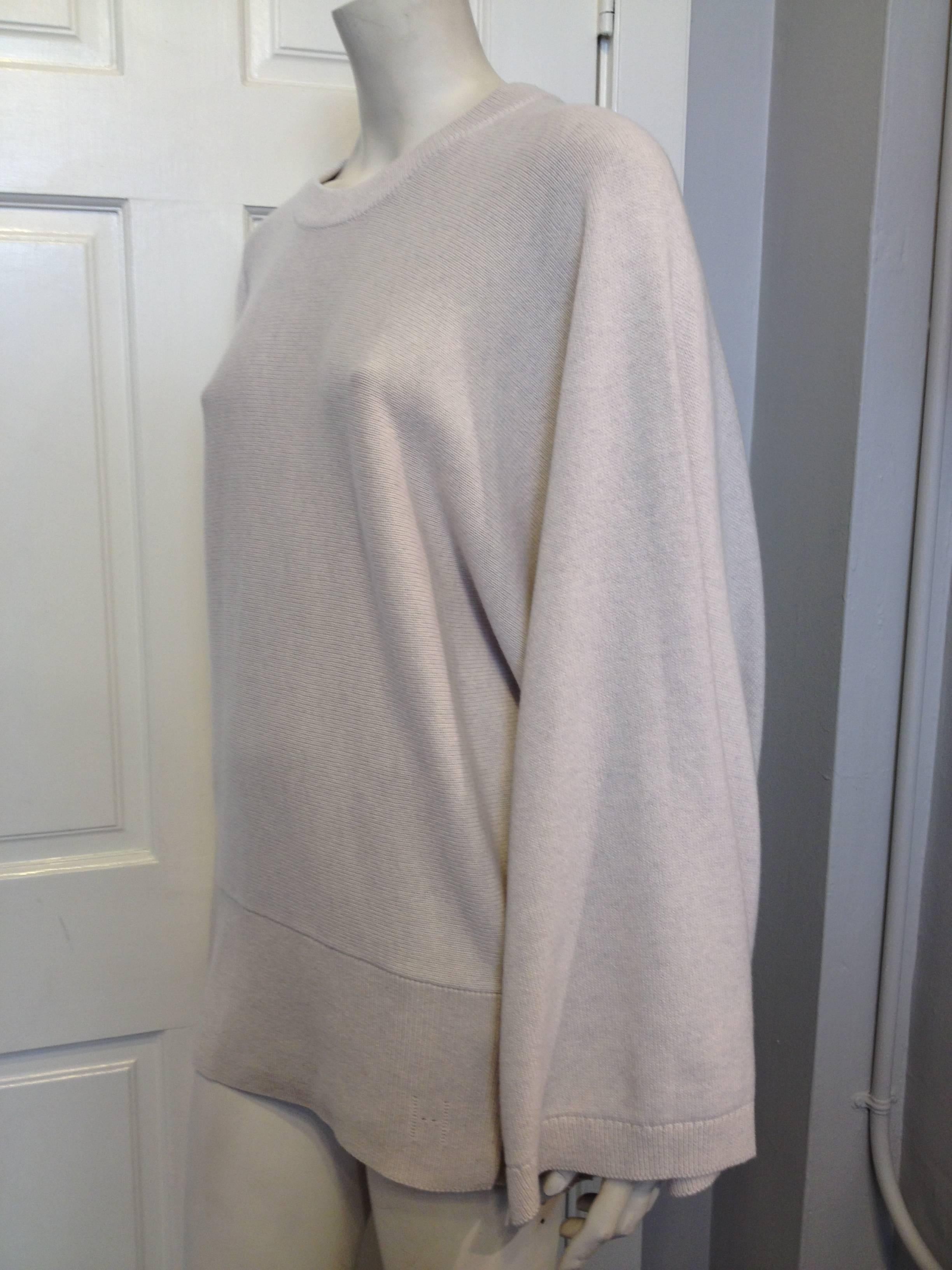 This sweater is the epitome of luxury! The cashmere is ultra soft and plushy, and the cut is beautiful - it's perfectly tailored but loose at the same time, with wide batwing sleeves and a slimmer waist. It is just the perfect shape for anything