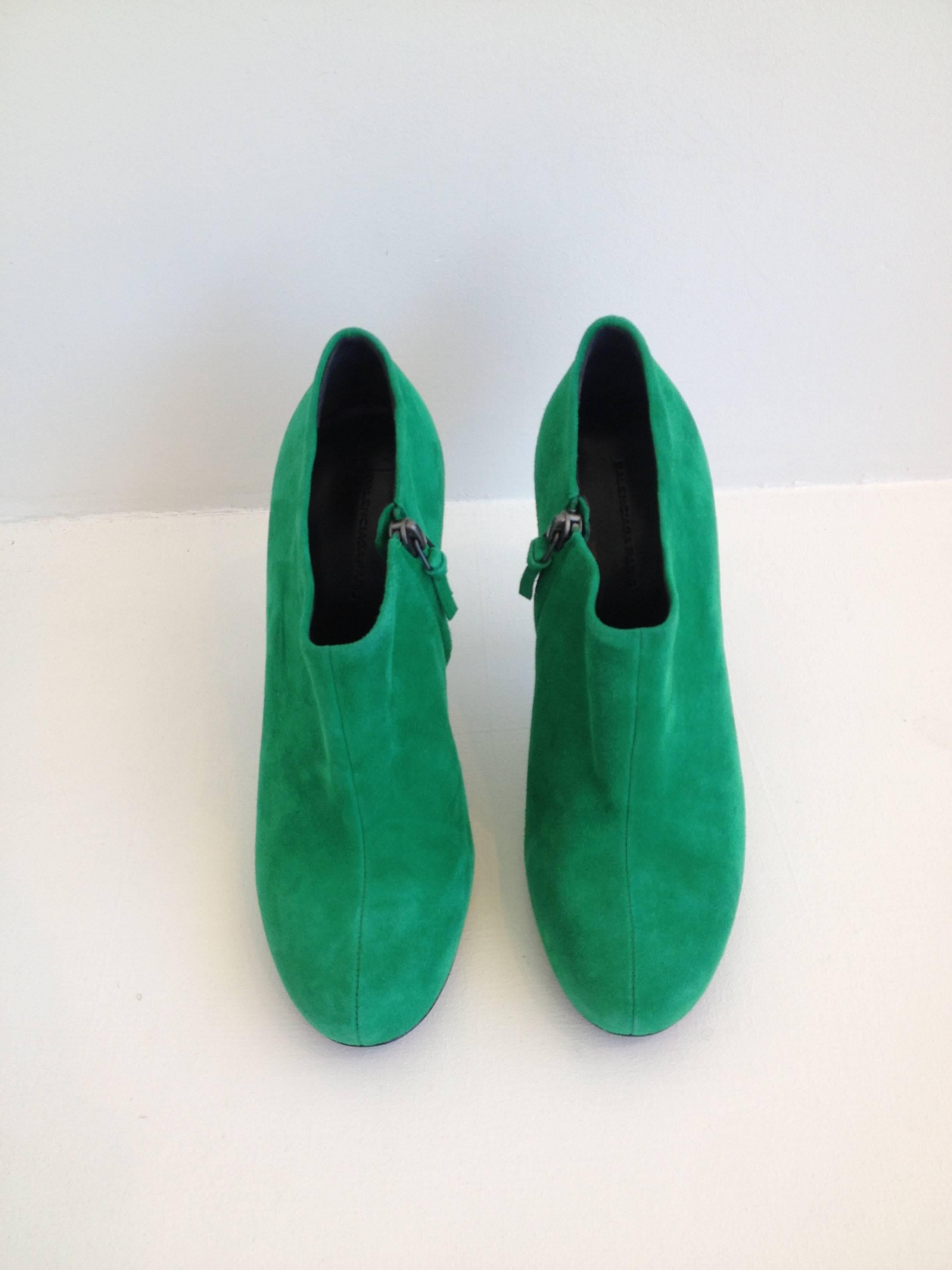 Bright and vibrant color is all you need to leap forward into spring. This pair by Balenciaga is fabulous - the exterior is made from a super saturated kelly green suede, perfect for adding a pop of color to any look. The 3.75 inch heel is covered