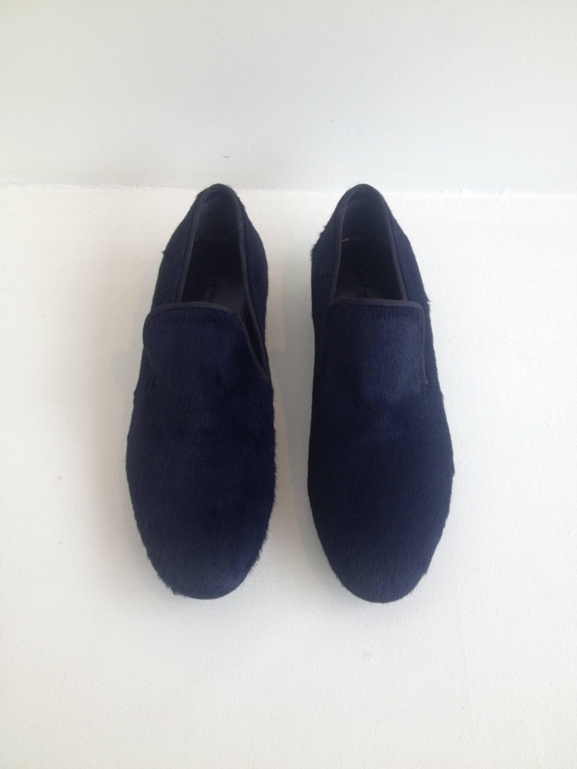 Both fabulous and sensible, these loafers are great for work or for play. The gorgeous navy blue ponyhair transitions from season to season, while the smoking slipper style is such a staple. The heel is three quarters of an inch, and the rounded toe