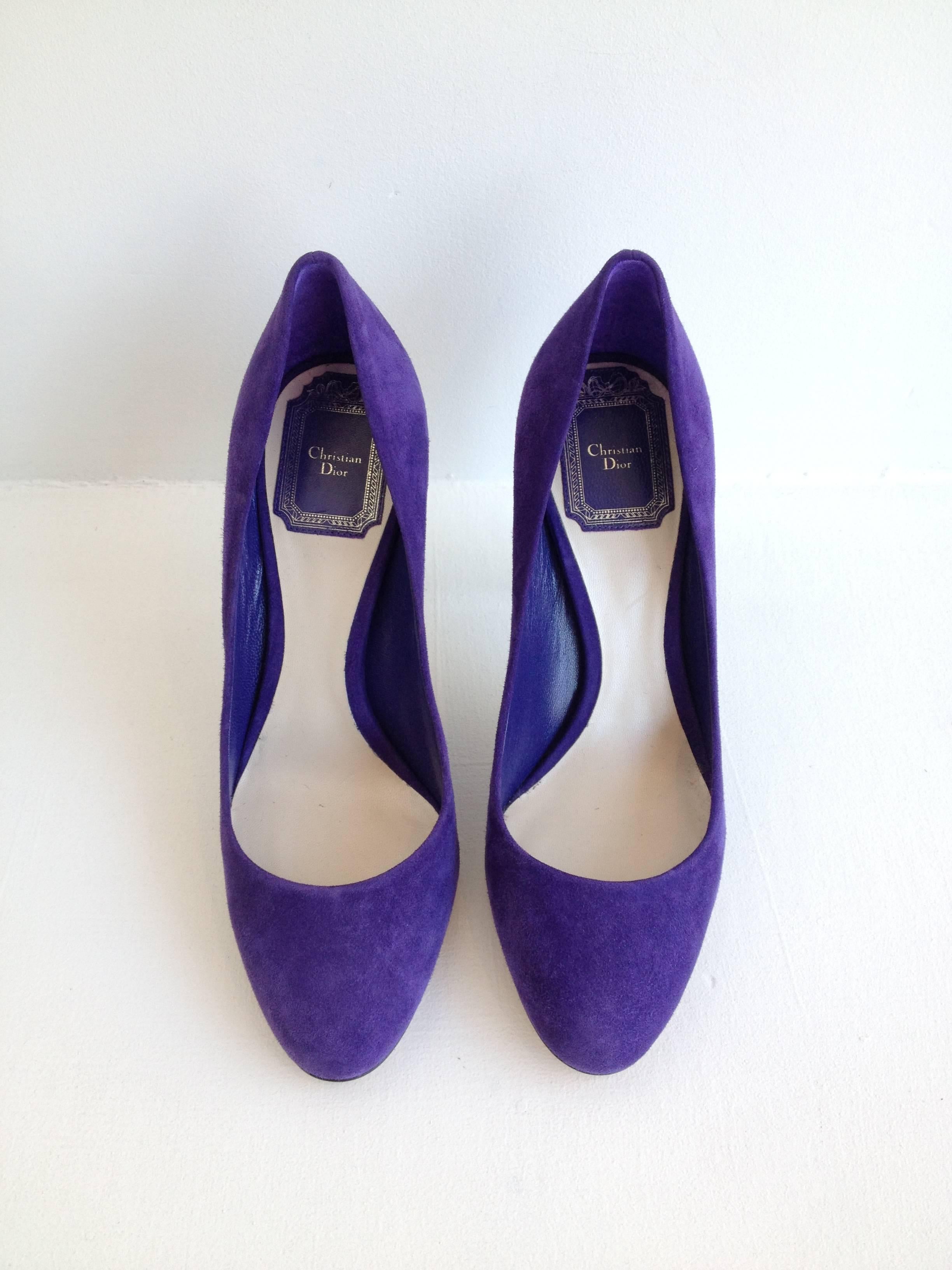Feminine but bold, these pumps by Christian Dior are the perfect antidote to wardrobe boredom. The shape is simple and classic and easy to pair with anything from summer dresses to jeans and a t-shirt, while the punchy purple suede is a lush and
