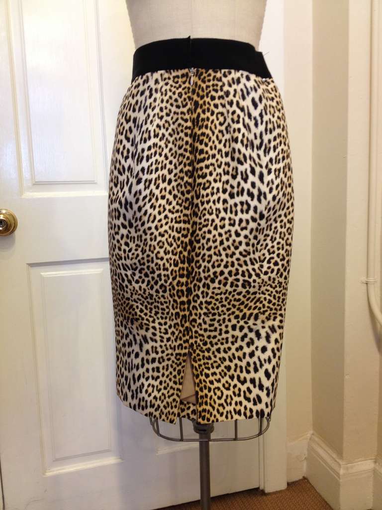 Work the room in this fitted animal print skirt.  Practically a neutral, you can pair this fun piece with just about anything!  We love a crisp white button down to contrast the print and a pair of fierce pumps.  Great for transitioning from work to