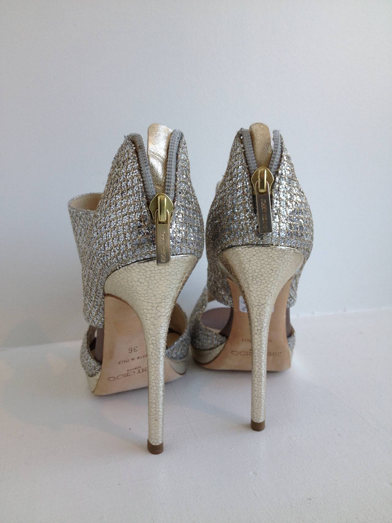 Jimmy Choo Silver and Gold Sparkly Heels In New Condition In San Francisco, CA