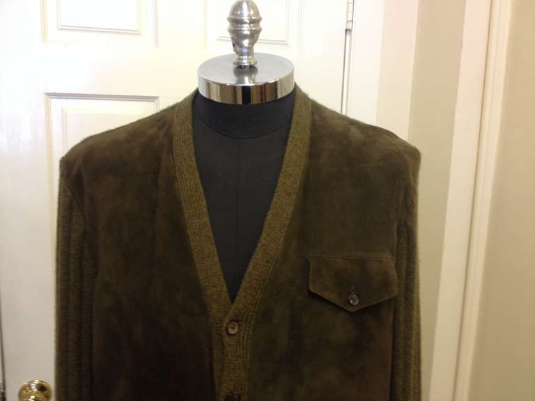 With super-soft suede front panels and a rib knit back and sleeves, this jacket is a great casual everyday piece. The mossy green color and easy style looks great thrown on over jeans or over a button up shirt. Please note, it is sold as is due to a