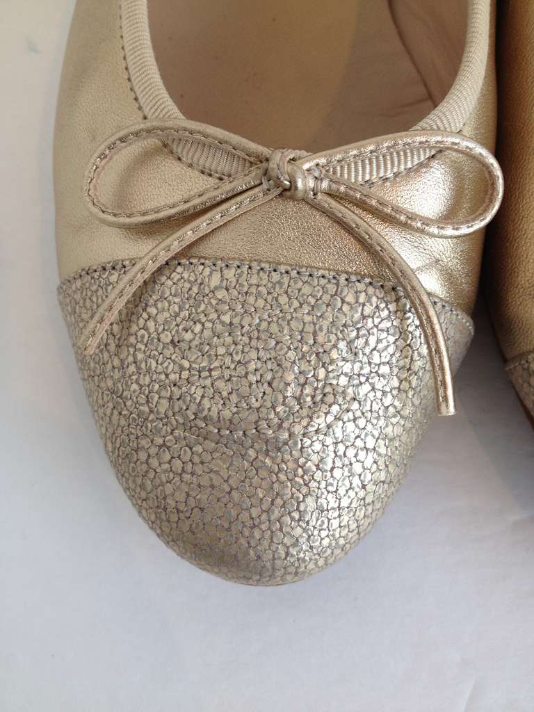 chanel gold ballet flats