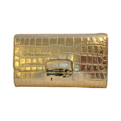 Used Michael Kors Gold Reptile Embossed Clutch