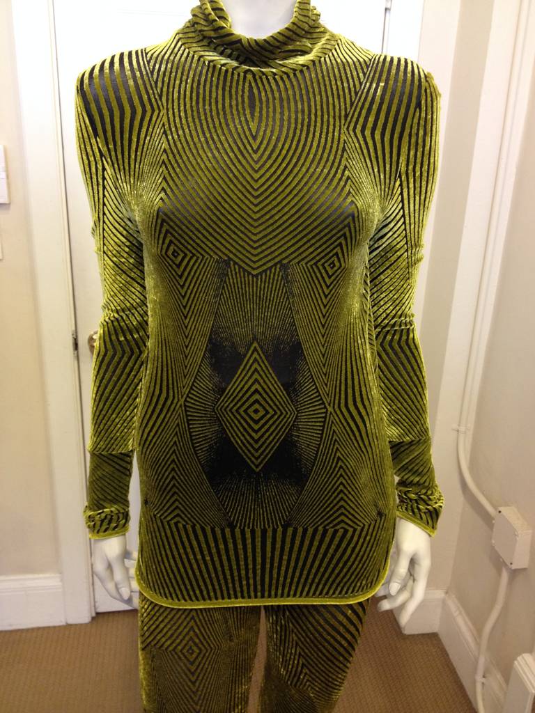 This two-piece ensemble is wild! Burnout velvet gleams in dark lime green, while the psychadelic geometric striping pattern looks like an optical illusion. Together, they create a statement look - wear with sexy heels and a high ponytail for a night