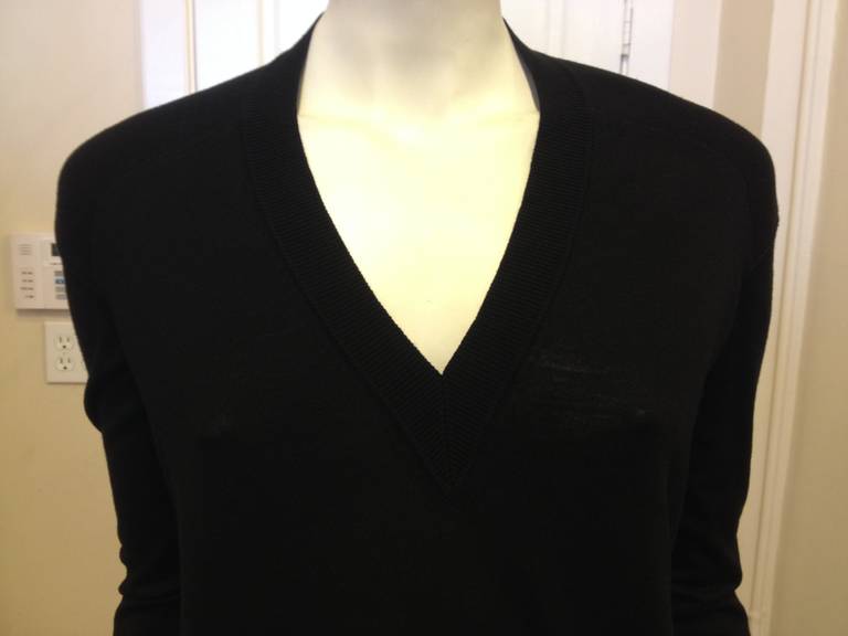 This is the perfect basic sweater - the simple look and styling belie exquisite construction and impeccable fit. The deep v-neck is always flattering, while the hem rises in the front and dips down in the back, creating an elegantly slouchy fit.