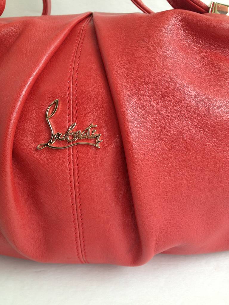 Now that famous Louboutin red isn't confined to just the soles of your shoes - you can carry it on your arm as well. This gorgeous leather bag has just the right amount of slouchiness to stay casual, while the classic combination of red with the