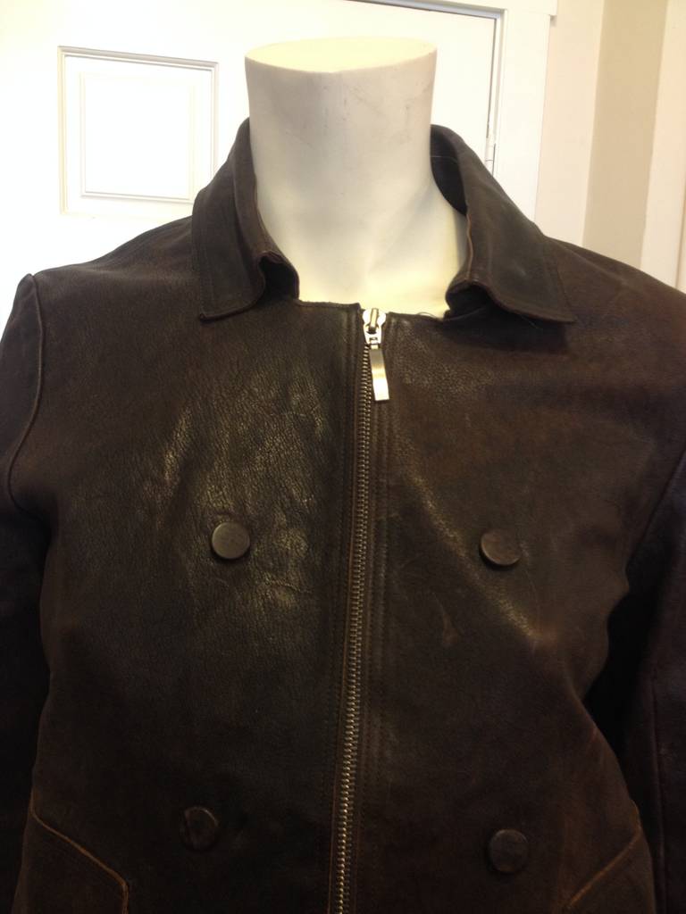 Every girl needs a perfect leather bomber jacket - something to toss on over a lacy cream dress or jeans and a t-shirt, for wearing around the city or on a long cross-country road trip. The dark chocolate brown is warm and goes with everything,