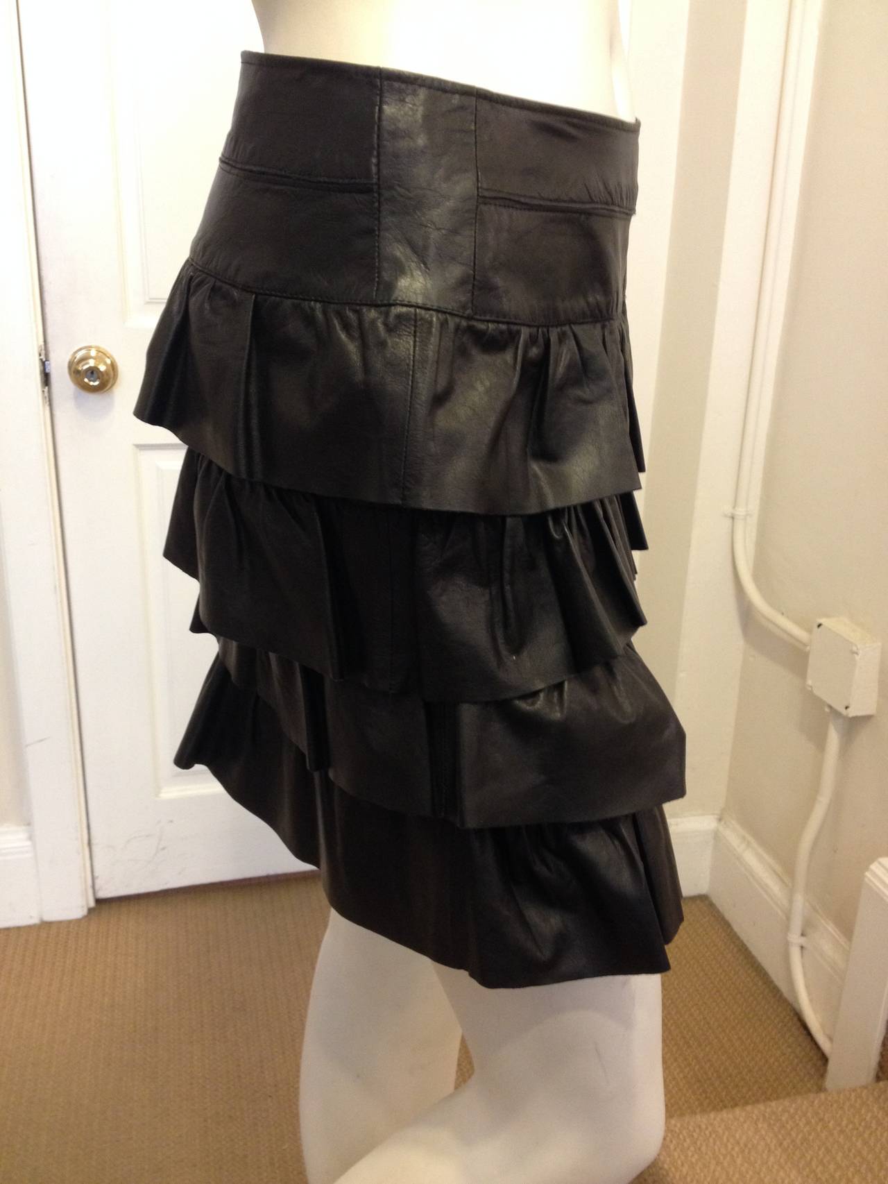 This Chanel ruffled skirt looks like straight from the runway!  Sassy and sweet at the same time, there are so many occasions for this piece. The flat hip part is extremely flattering while the four equal ruffles add an attractive playfulness.