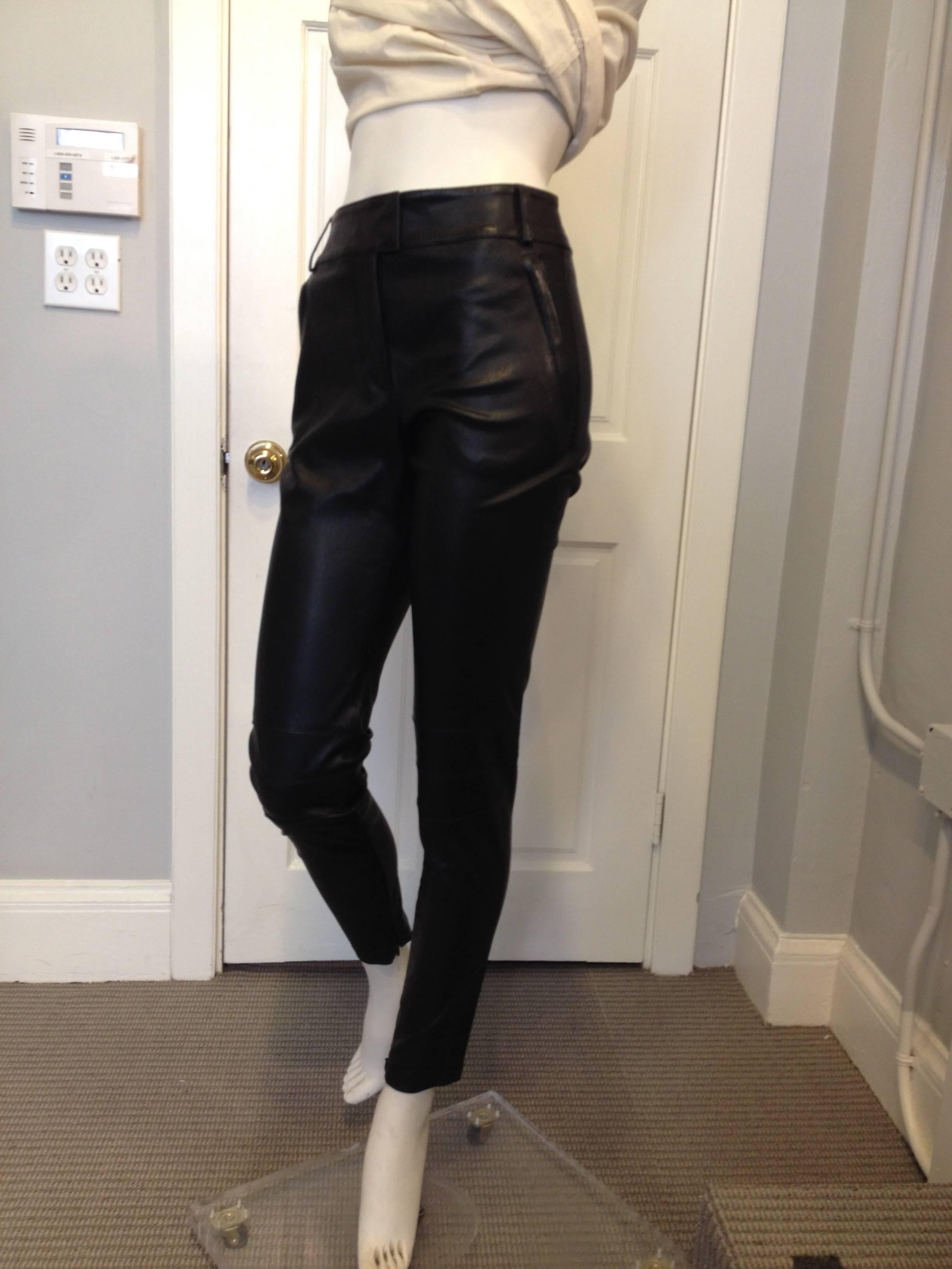 There's nothing more rock & roll than a pair of black leather pants. These have all of the attitude that Givenchy embodies - they're cut super skinny, with zippers at the ankles and crossing belt loops in the shape of an X at the back. The leather