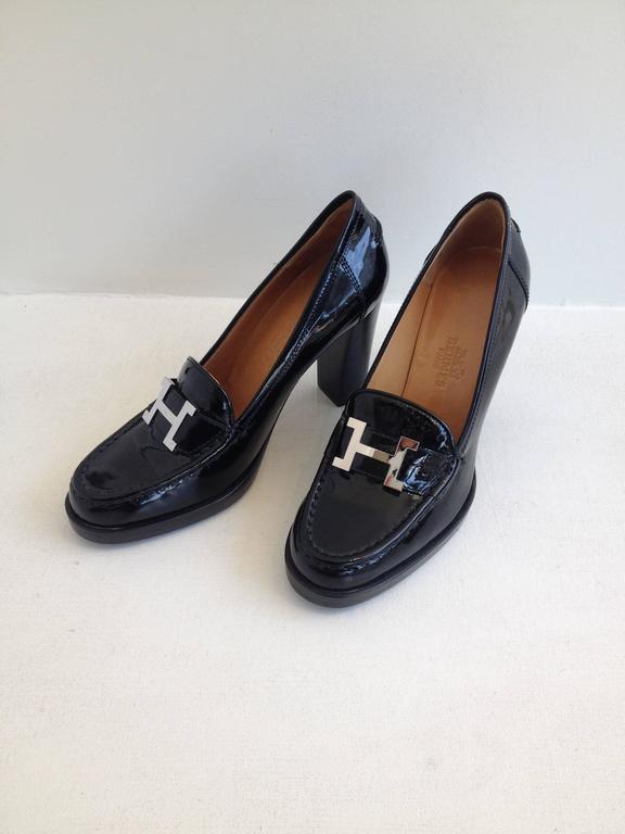 Hermes Black Patent Heeled Loafers at 1stDibs