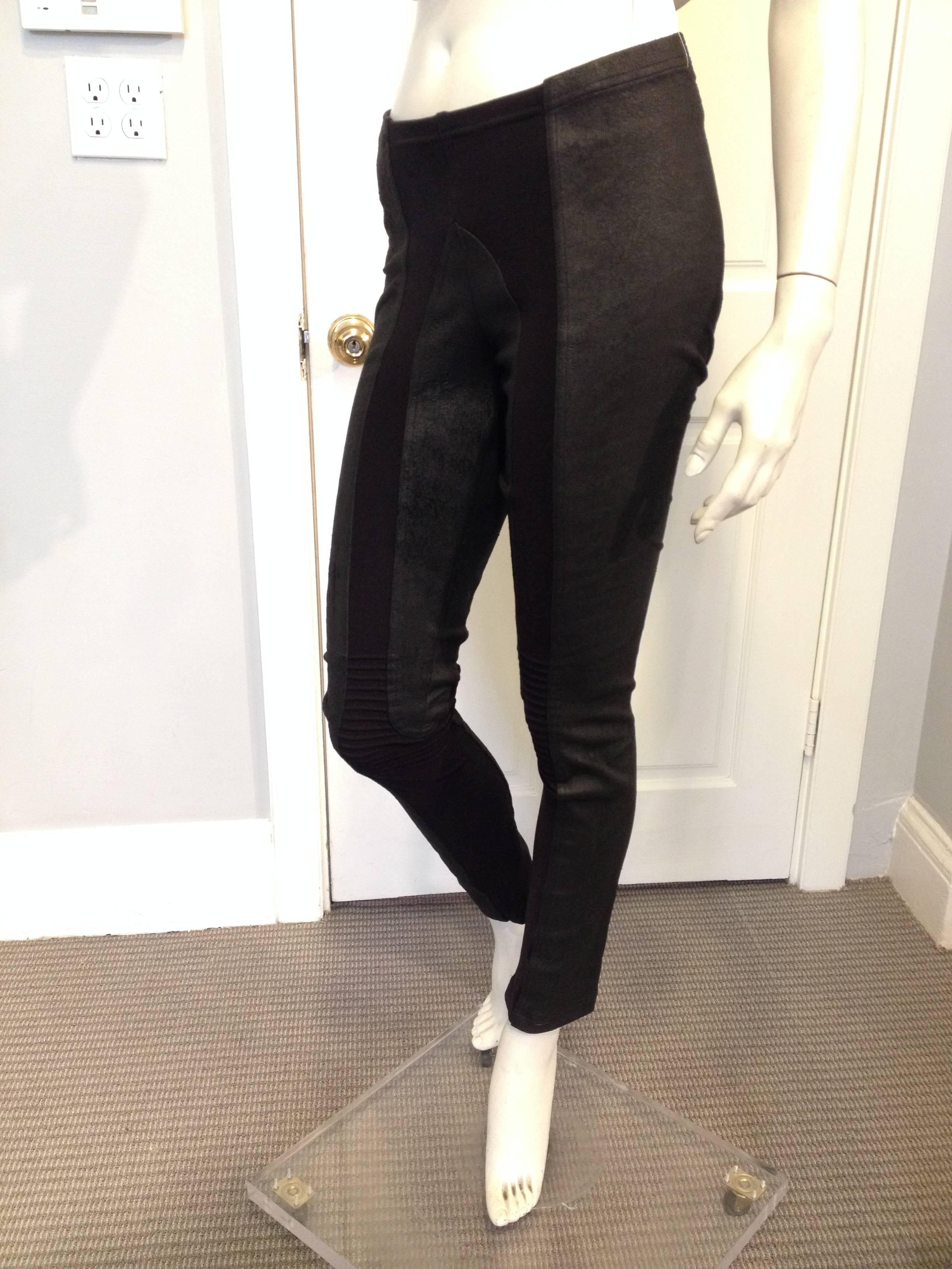 Slick and modern, these Rick Owens leggings are the perfect way to wear leather. The texture is ultra cool - it's soft and crackled, with a finish that's both shiny and matte at the same time. The piece is constructed from alternating panels of