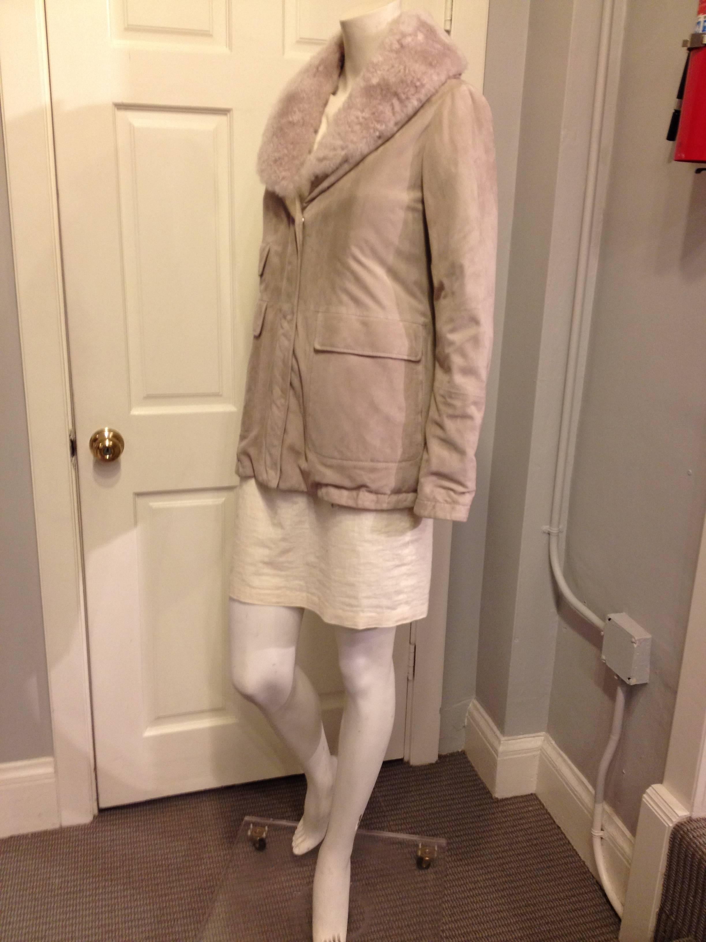 Brunello Cucinelli items are unfailingly items of such pure luxury - they're made from excellent materials, impeccably cut, and styled classically. The beautiful matte bisque suede of this jacket is incredibly dreamily soft and so lightweight, and