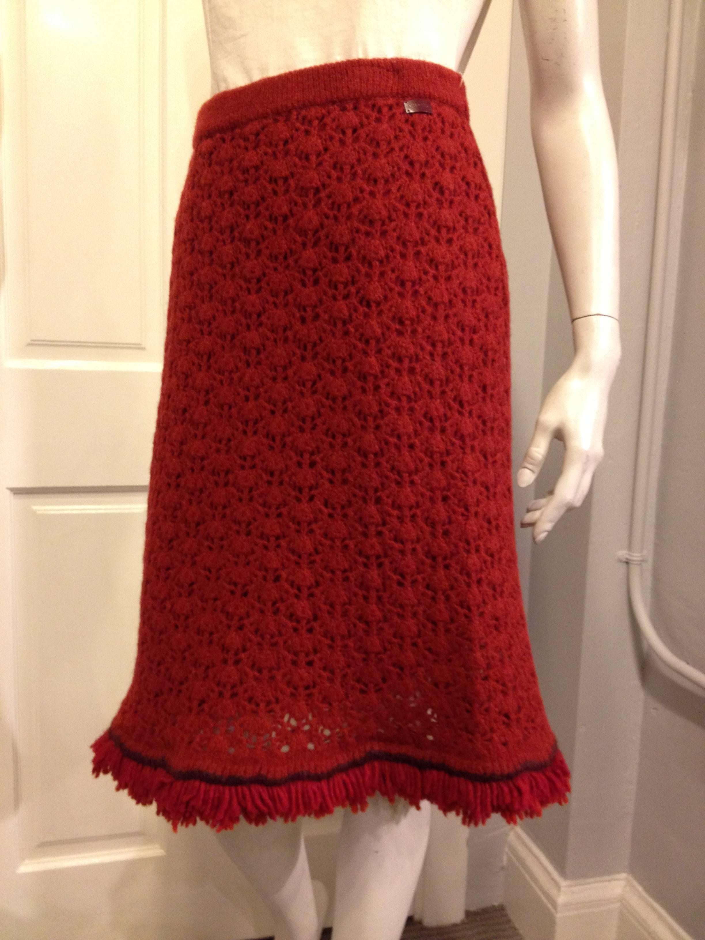 This skirt has the warmth and appeal of something created just for you - it's gorgeously crafted, just like a handmade knit, but all together feels very Chanel when worn. The deep autumnal rusty red color feels so perfect on the thick, wooly strands