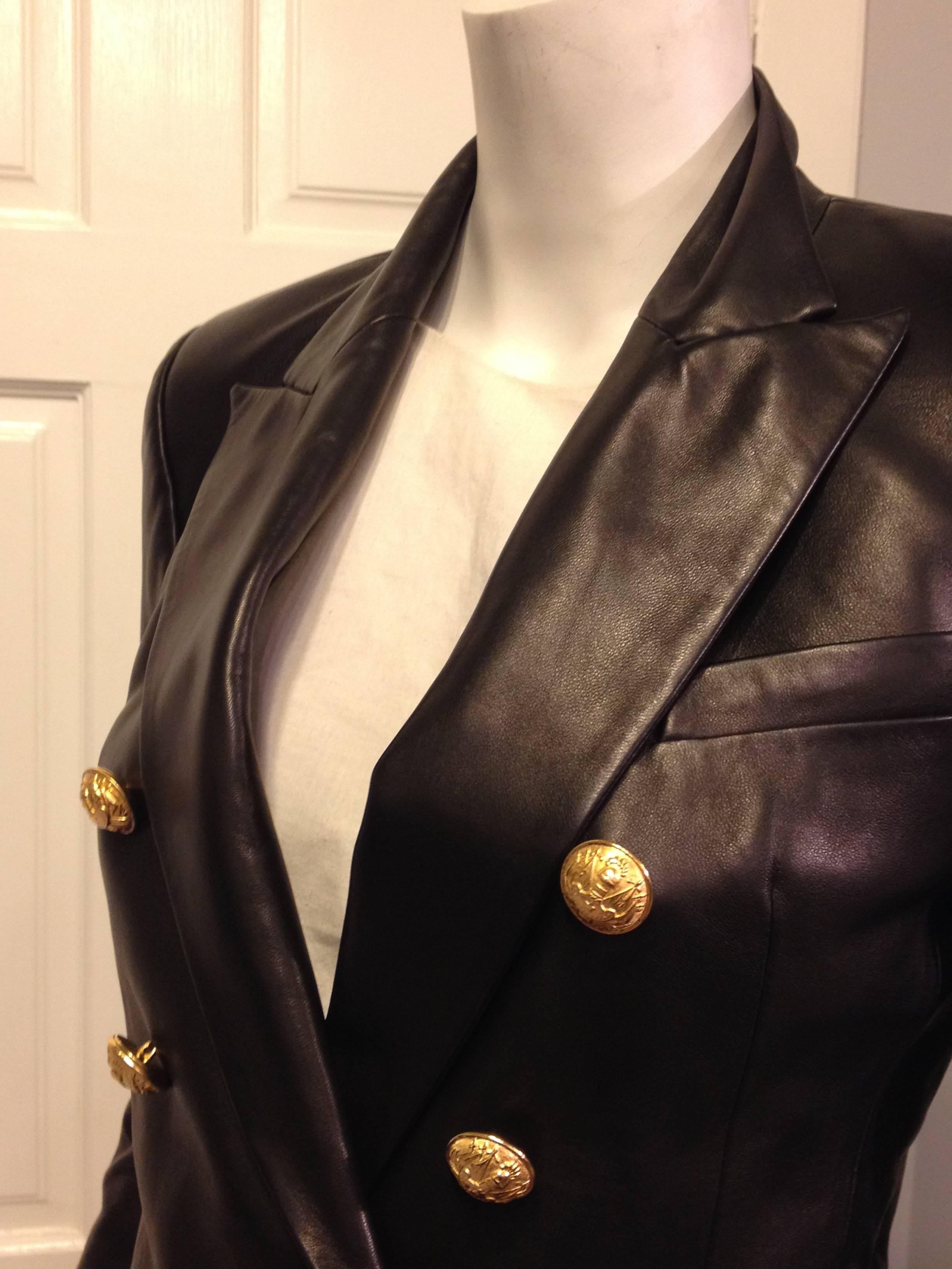 black leather jacket with gold buttons