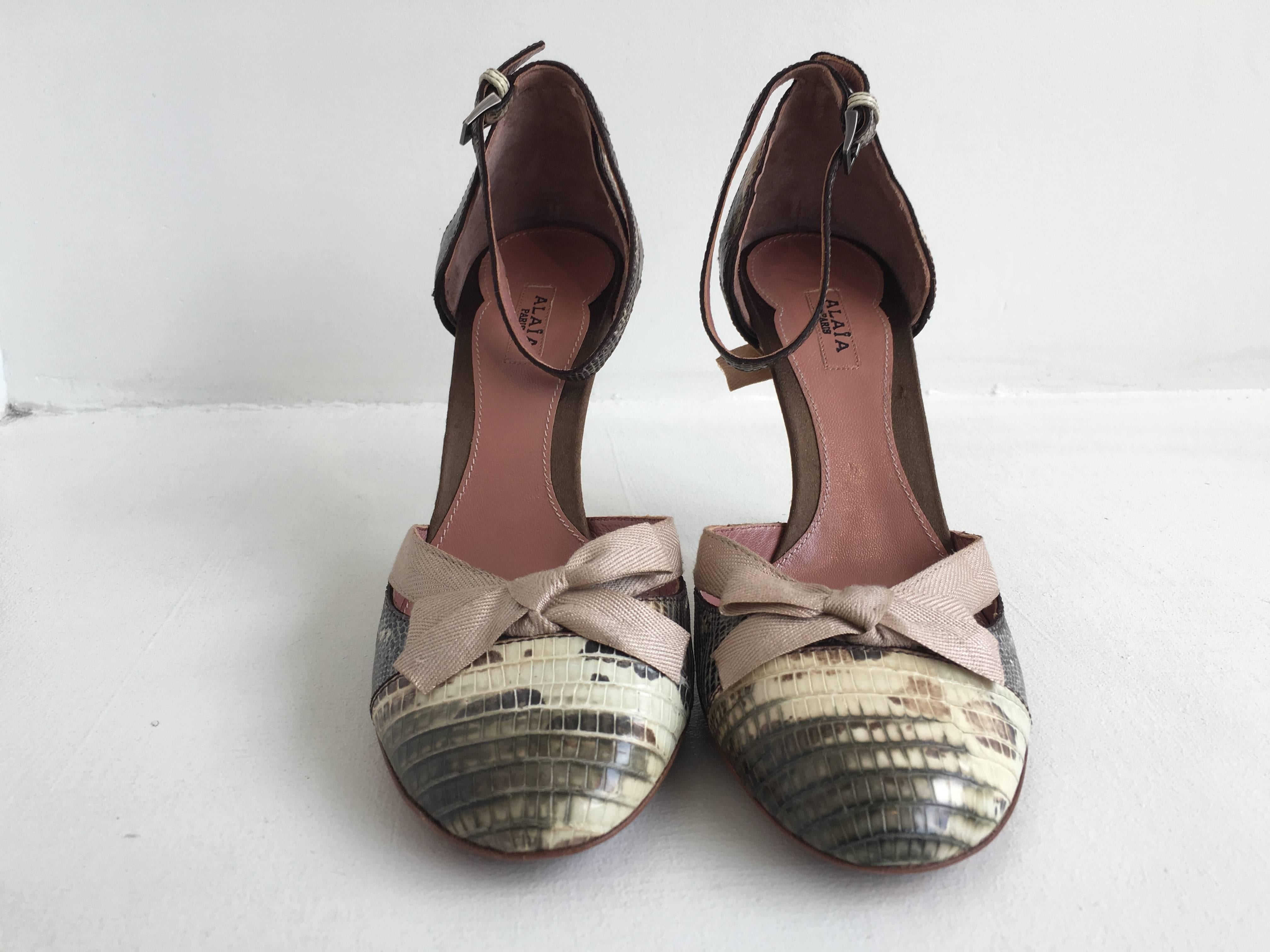 Alaia mottled browns and cream lizard d'Orsay heel with petite nude bows on the toe and heel