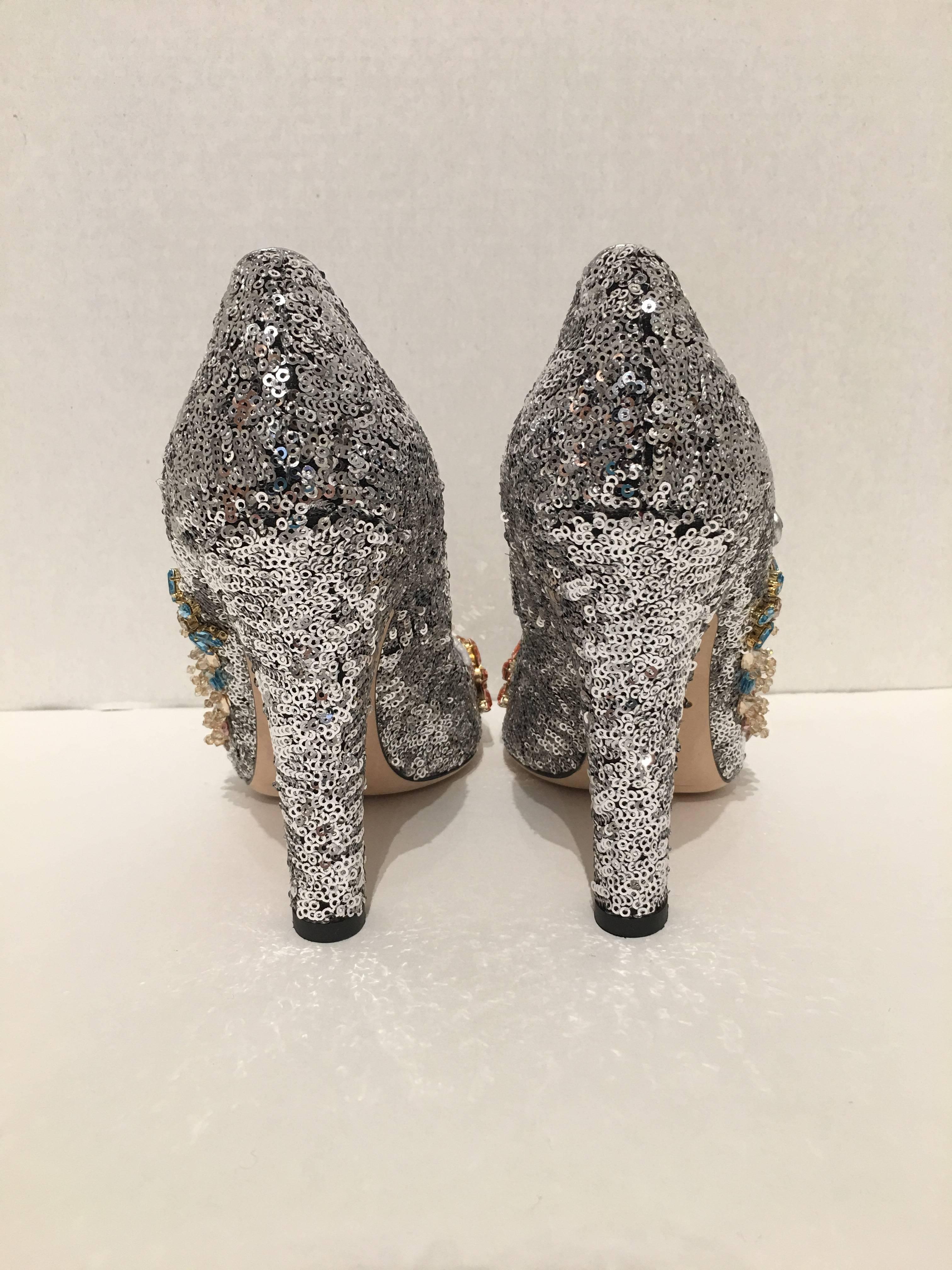 Dolce & Gabbana mary jane pumps in silver sequins with Swarovski crystal flower embellishment on toes and sides..