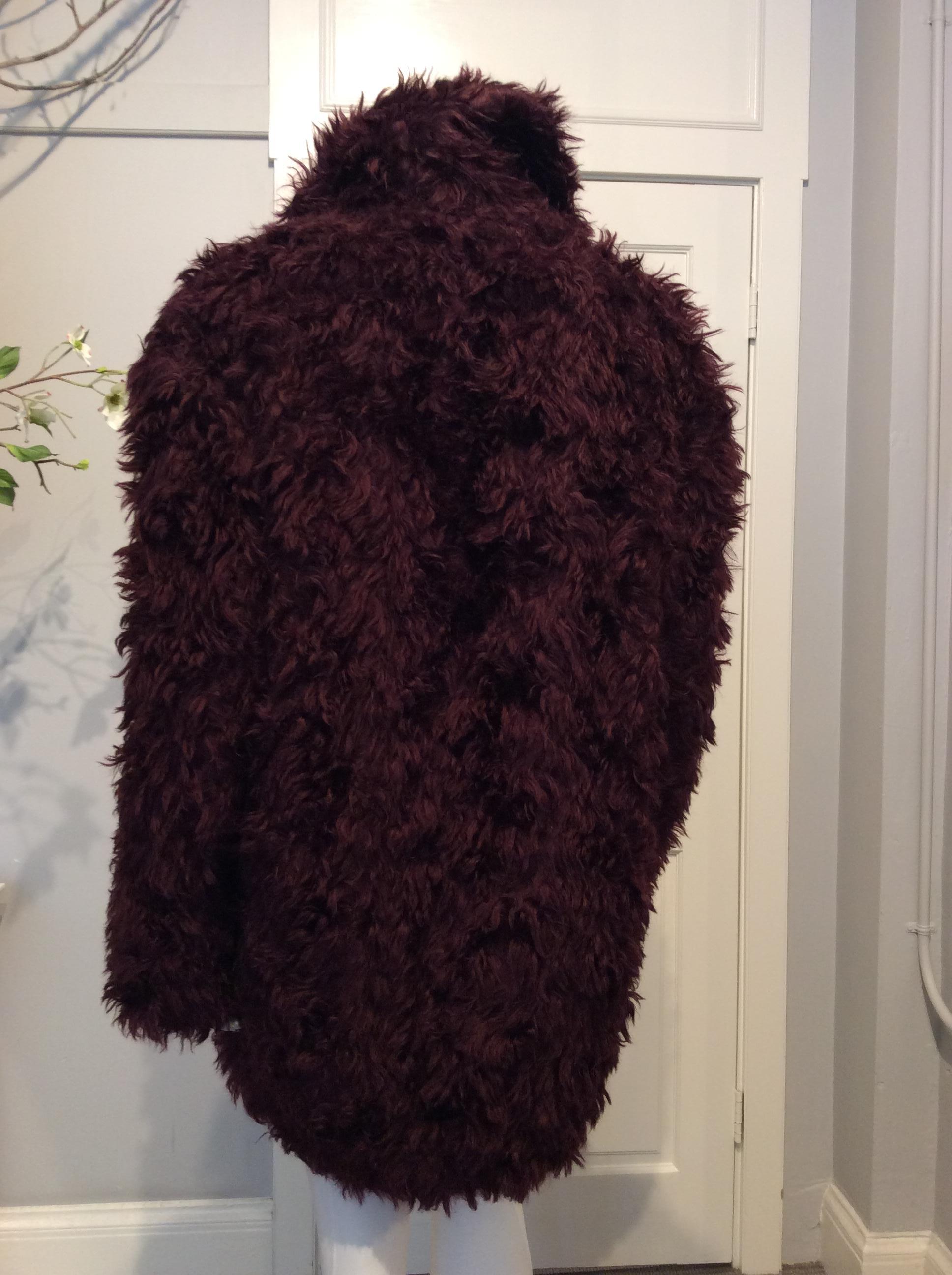 Artisanal Maison Martin Margiela maroon angora double breasted coat with two seam pockets. Two additional inside breast pockets.
Fur origin South Africa. 
New with tags. 


