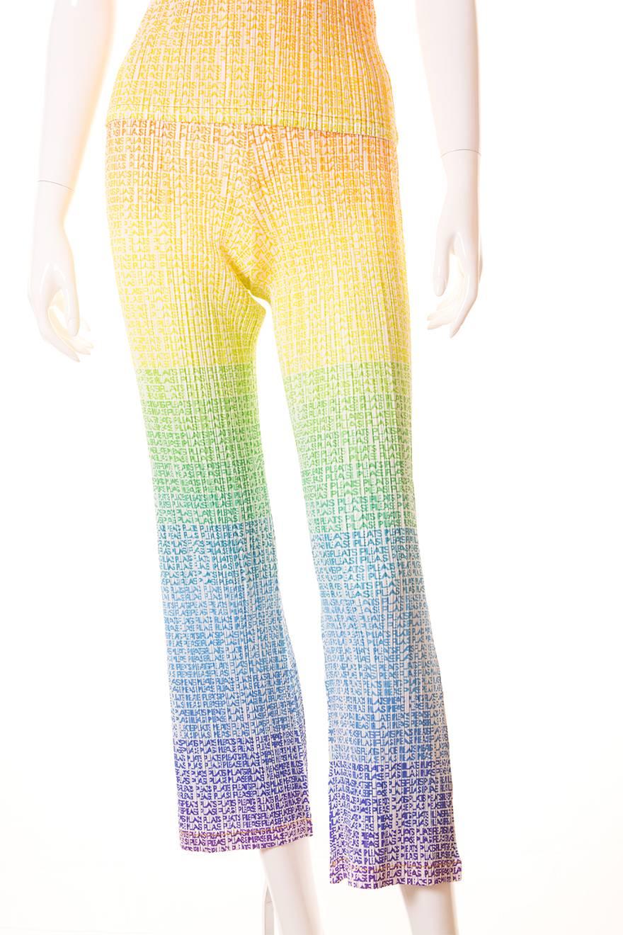 This incredible tshirt and pant set by Issey Miyake Pleats Please features a stunning rainbow gradient print.  The rainbow print is made up of the repeating 