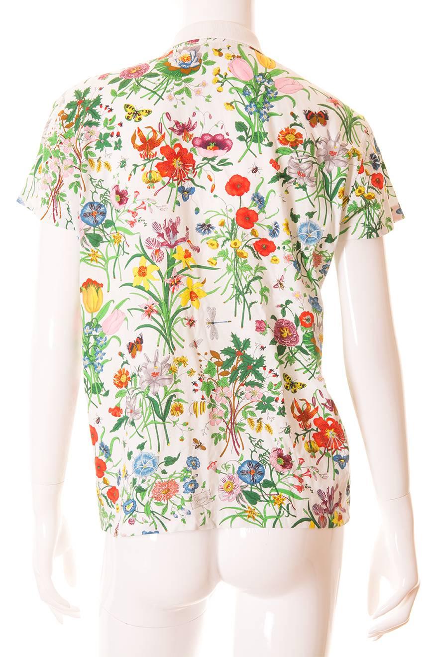 This collared tshirt by Gucci features the label's instantly recognisable 'Flora' print. The iconic print was designed by the illustrator Vito Accornero for Princess Grace on Monaco in 1966 and has since become one of fashion's most well known