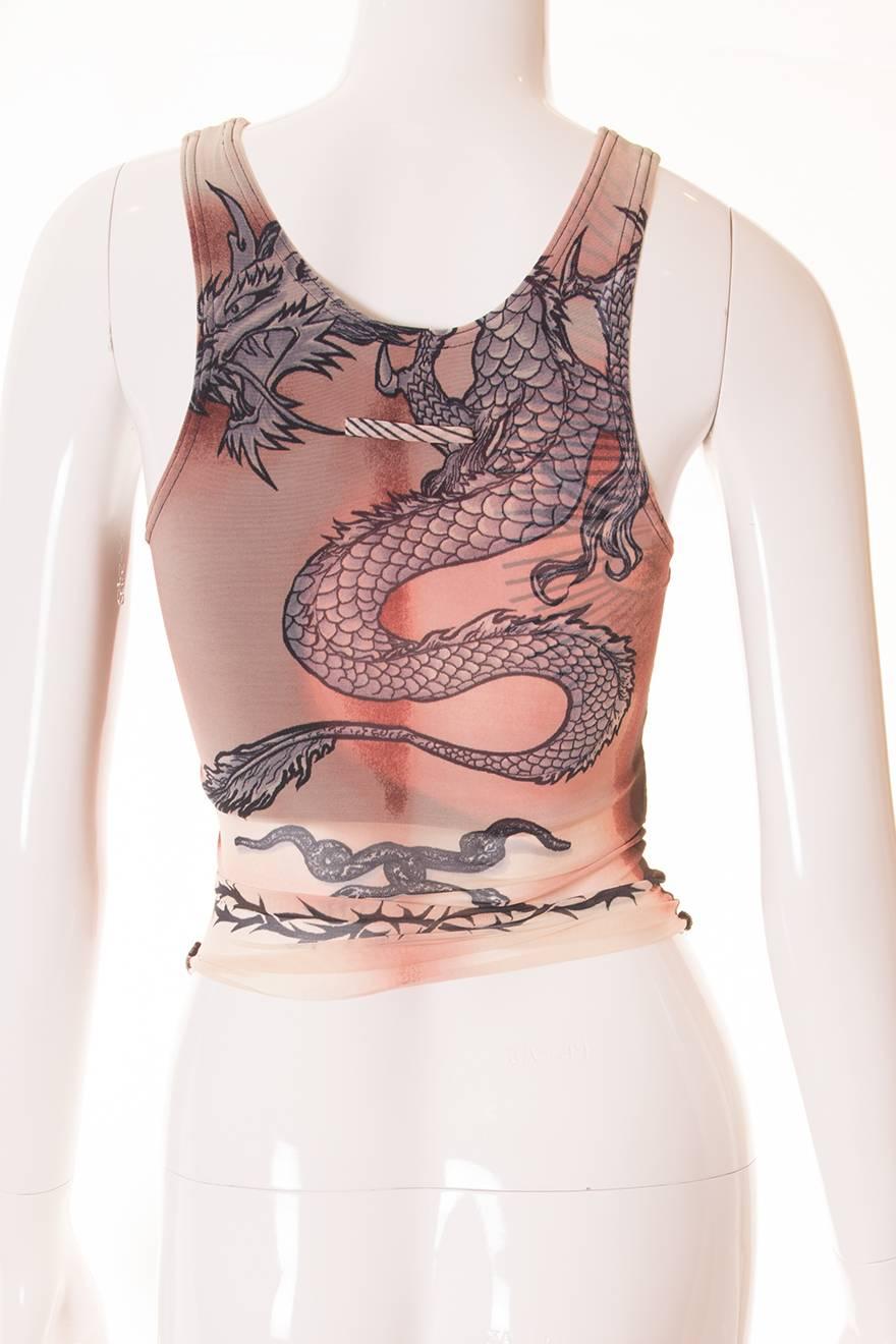 This crop top is from Jean Paul Gaultier's A/W 1994 collection and features a tattoo inspired design with the words 