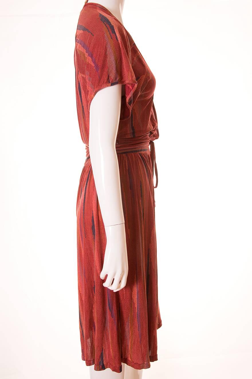This incredible dress by Missoni is made of the most lightweight, delicate silk.  While the piece dates back to the 70s, the design is very current and 'now'.  It features an ultra-plunging neckline.  Our mannequin does not do this piece justice;