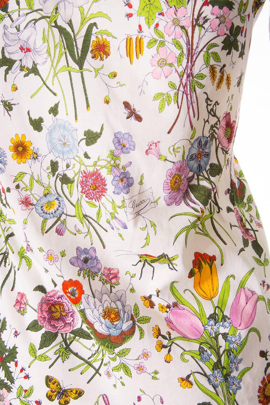 Button up shirt by Gucci in the label's iconic Flora print.  Designed by Vito Accornero, the flora print was originally created for a scarf for Princess Grace of Monaco.  The print grew to become one of the most iconic and recognised prints in