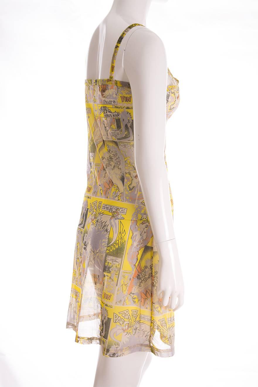 Sheer sleeveless dress by JPG, featuring a comic strip print.  The print features a character named “Virus Man” and is a commentary on safe sex and the AIDS epidemic.  A rare and collectible piece designed by Jean Paul Gaultier.

No marked