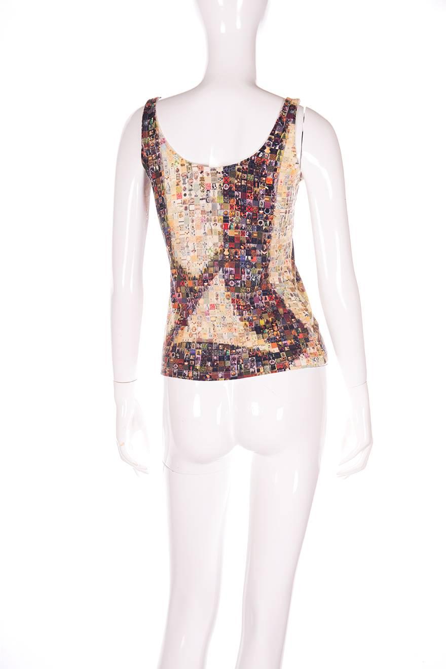 Tank top by John Galliano with a photo mosaic of the man himself.

Marked size: M
To fit: M

Measurements:
Chest: 42 cm
Length: 55 cm

Excellent condition demonstrating only some very minimal wear to the fabric.