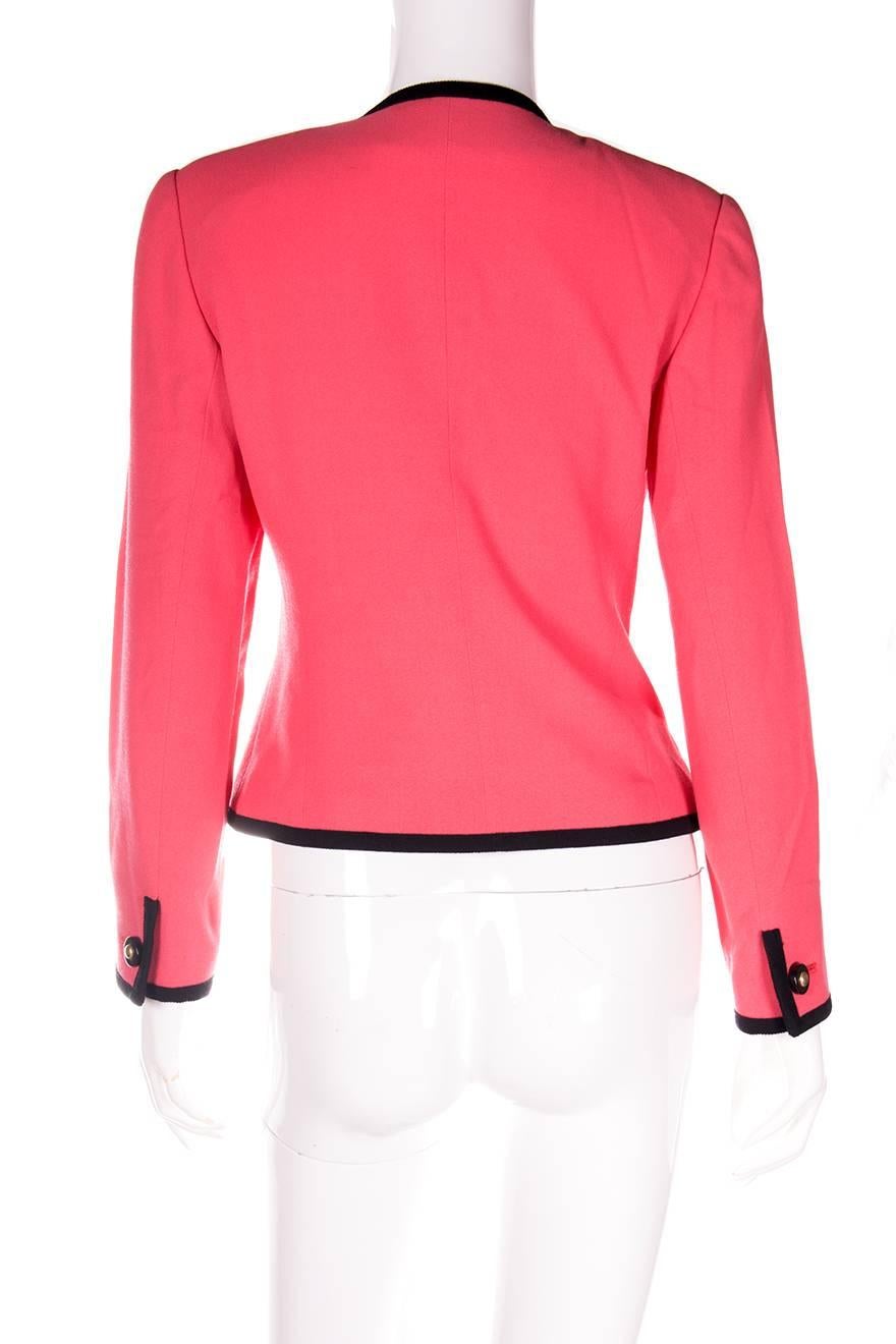 Jacket by Karl Lagerfeld in the most vibrant shade of coral pink.  Contrast black piping and black buttons.  Circa 1980s.

Marked size: No marked size
To fit: S-M

Excellent condition demonstrating little to no signs of