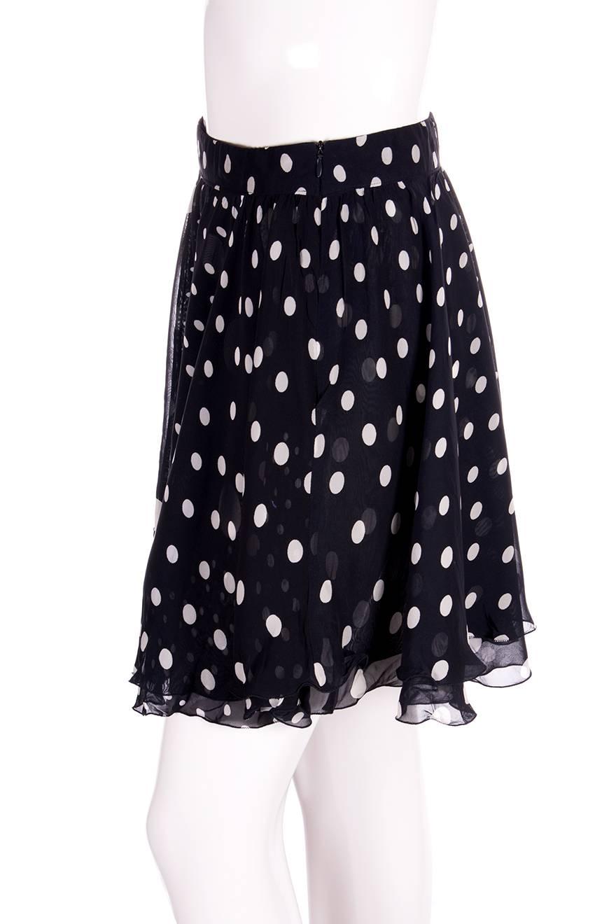 Black and white polka dot skirt by Gianni Versace 

Excellent condition demonstrating few signs of visible wear - one small mark on the skirt
 

Marked size - 38 (IT)
To fit - S 
Waist: 35 cm
Length: 46 cm