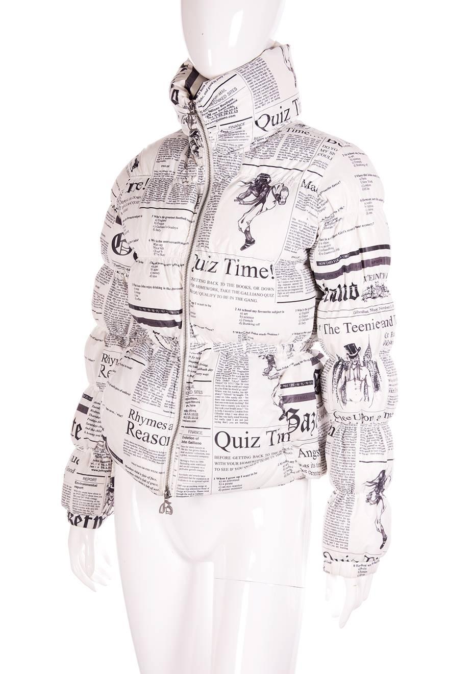 Puffer jacket by John Galliano in an allover newspaper inspired print. Circa '00s

Excellent condition demonstrating little to no signs of visible wear

Marked size: 14
To fit: XS-S
Chest: 41 cm
Waist: 37 cm
Length: 55 cm