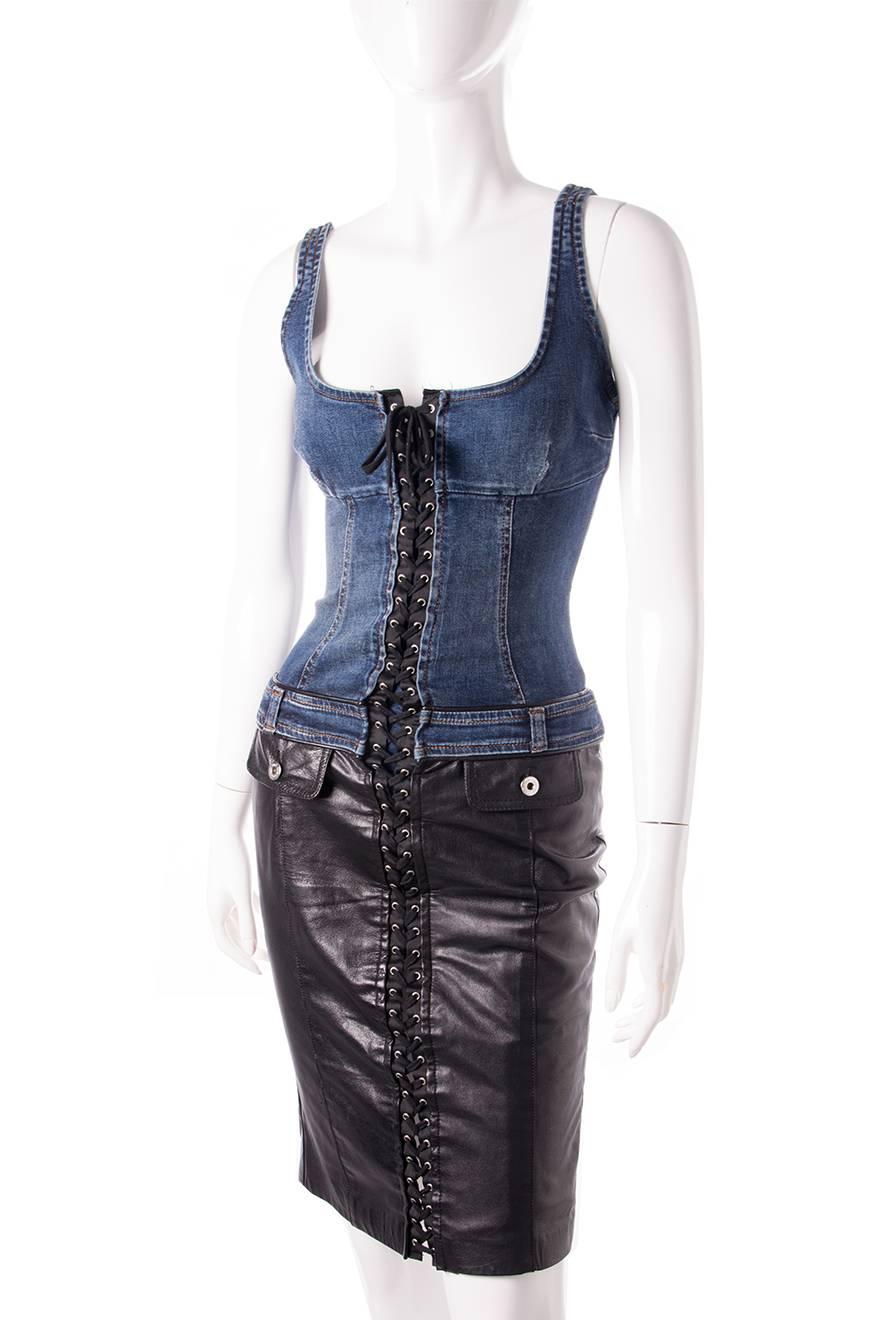 Ultra sexy lace up dress by D&G. Denim bodice and pleather skirt. Zip closure at the back. Circa 90s   

Excellent condition demonstrating little to no visible signs of wear.

 Marked size: 26/40 (IT)
To fit: S

Chest: 40 cm
Waist: 31 cm
Hips: 43