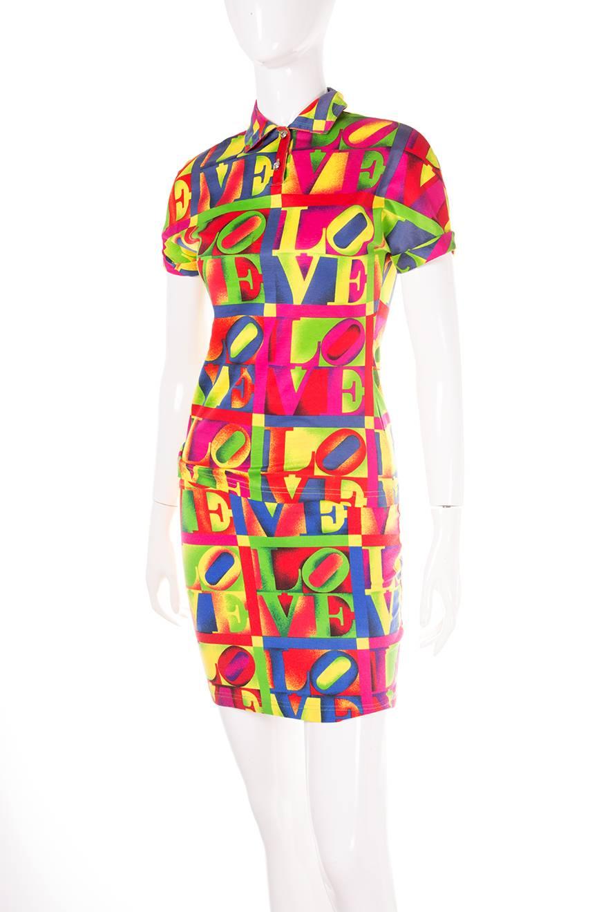 Top and skirt by Versace Jeans Couture in print inspired by Robert Indiana's famous “Love” sculpture. Circa 90s.

Excellent condition demonstrating minimal signs of wear
  
Marked size: 28/42 (IT)
To fit: S

Top
Chest: 38 cm
Length: 56