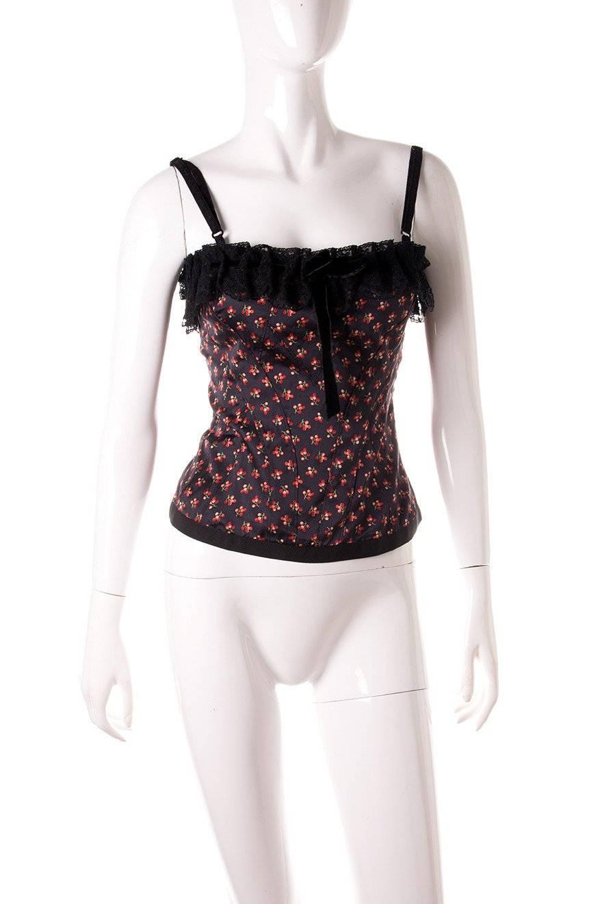 Cherry print bustier by D&G.  Velvet bow at the front of the top.  Lace trim.  Adjustable straps.  Circa 90s.

Excellent condition demonstrating little to no visible signs of wear

 

Marked size: 26/40 (IT)

To fit: S

 

Chest: 42 cm

Waist: 33