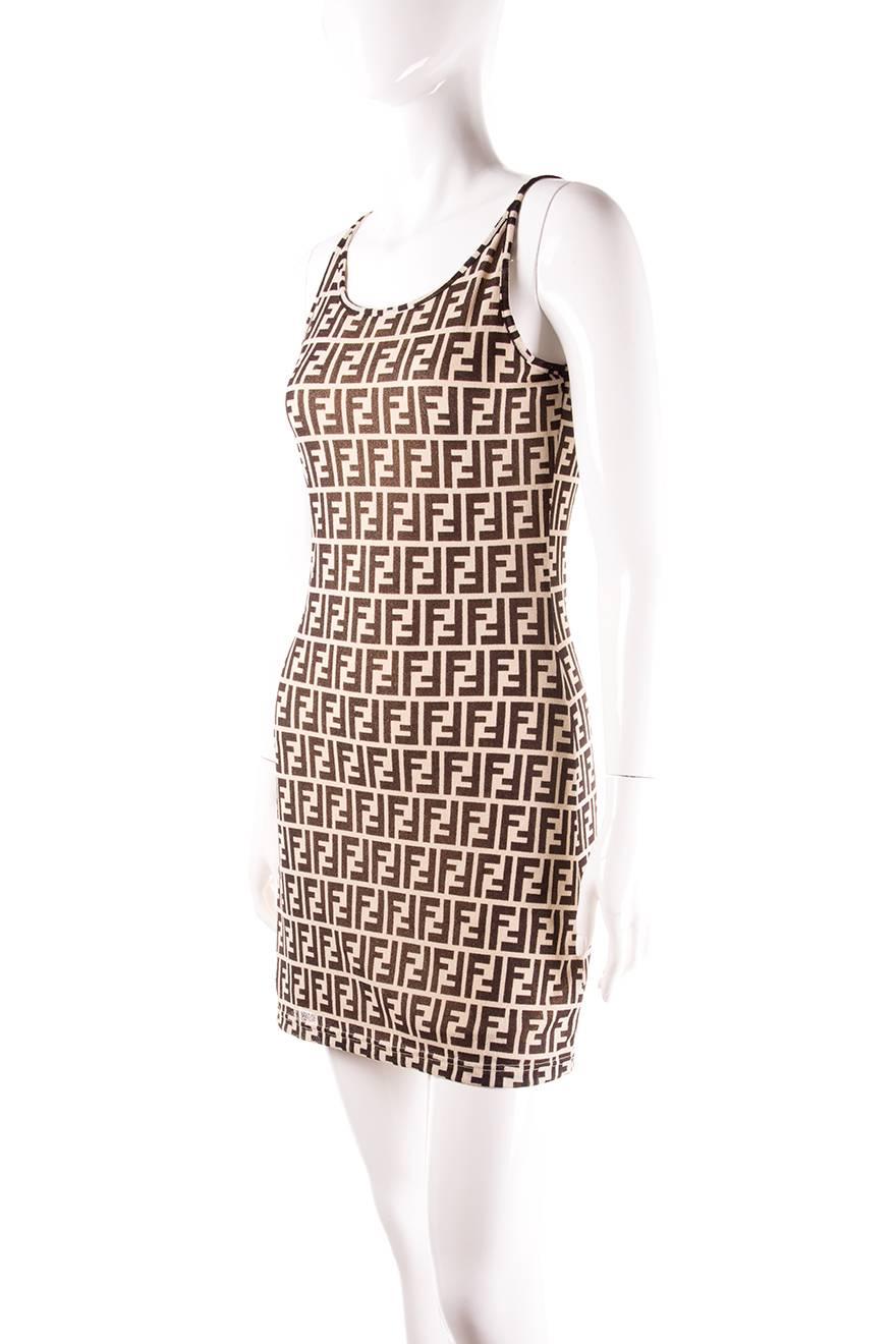 

Monogram print dress by Fendi in an allover brown and beige logo print.  Circa 90s.

Very good condition.  One small ladder and hole at the front of the dress.  This is quite difficult to see when worn.  

 

Marked size: No marked size

To fit: