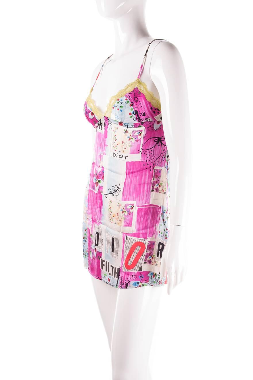 

Slip dress by Dior in a collage style print.  This dress has the words 