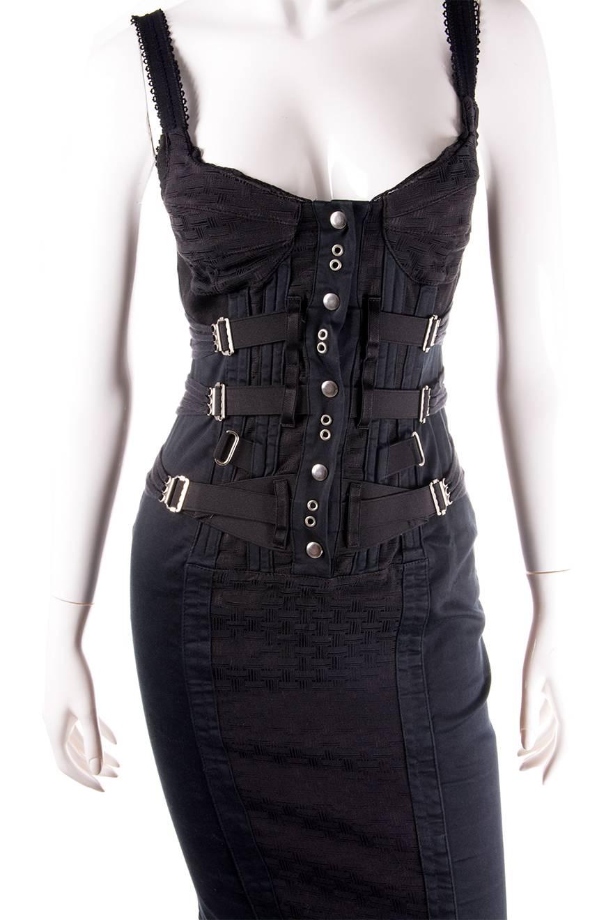 

Ultra sexy black corset dress by D&G.  Articulated bust cups.  Press studs going down the front of the dress.  Circa 90s.

Excellent condition demonstrating little to no visible signs of wear.

 

Marked size: 26/40 (IT)

To fit: S

 

Chest: 36