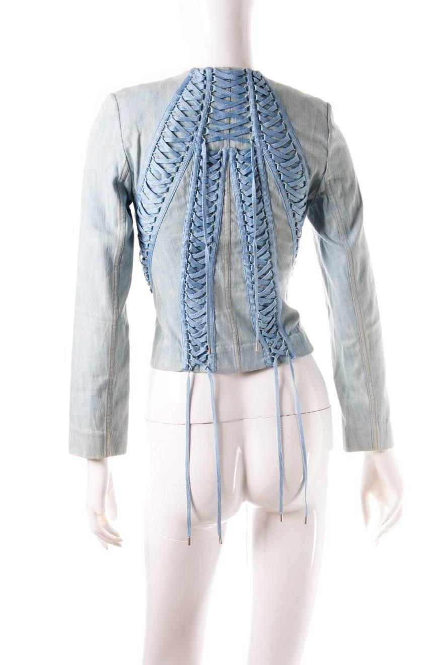 

Denim jacket by Christian Dior featuring an incredible lace up detail on the front and the back of the jacket.  John Galliano era Dior.  Circa 00's.

Excellent condition demonstrating little to no visible signs of wear.

 

Marked size: 36